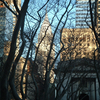 Photo in New York of Chrysler building viewed through Bryant Park